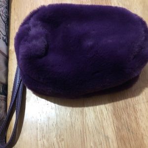 Fuzzy purple clutch bag